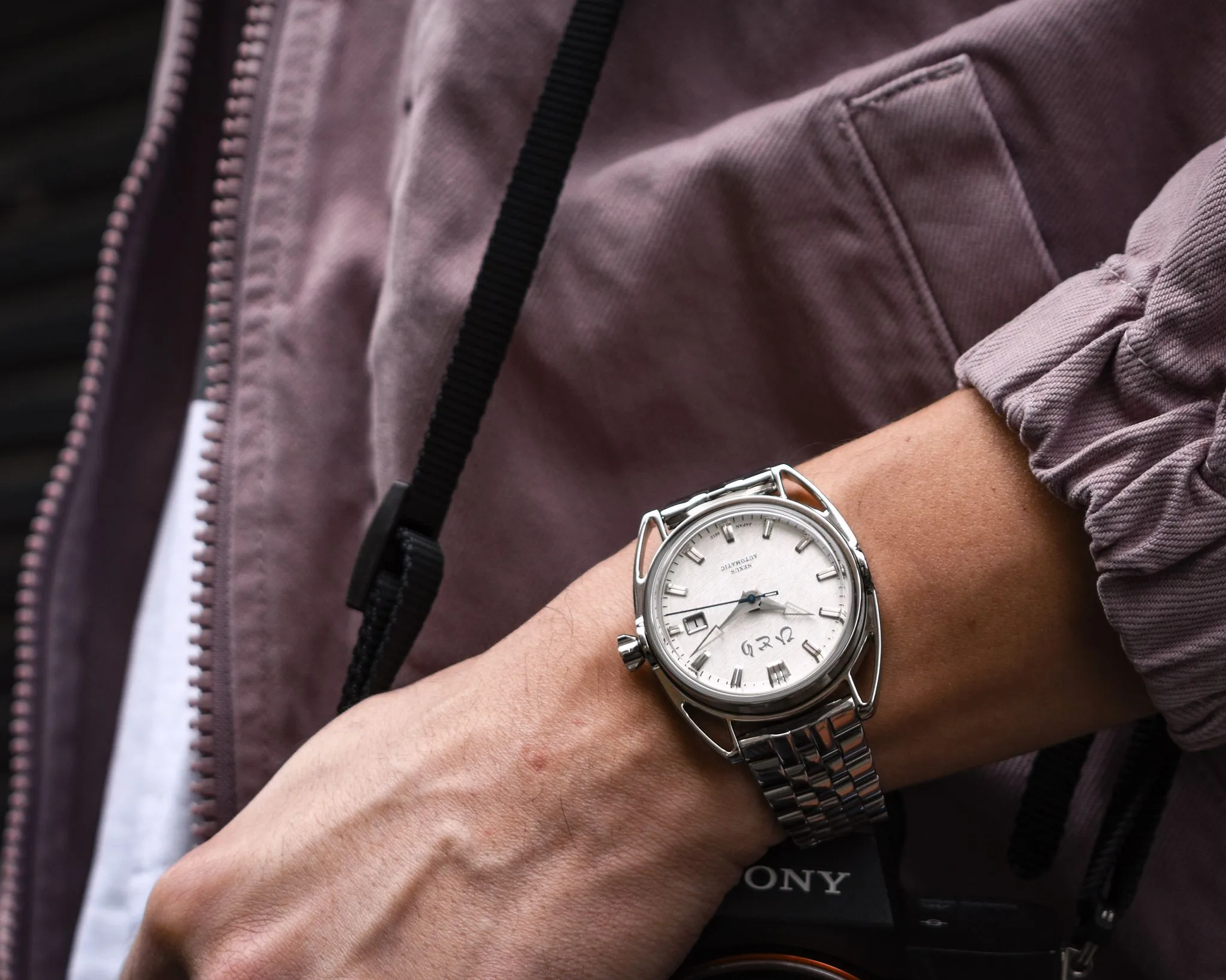 Nexus white on wrist
